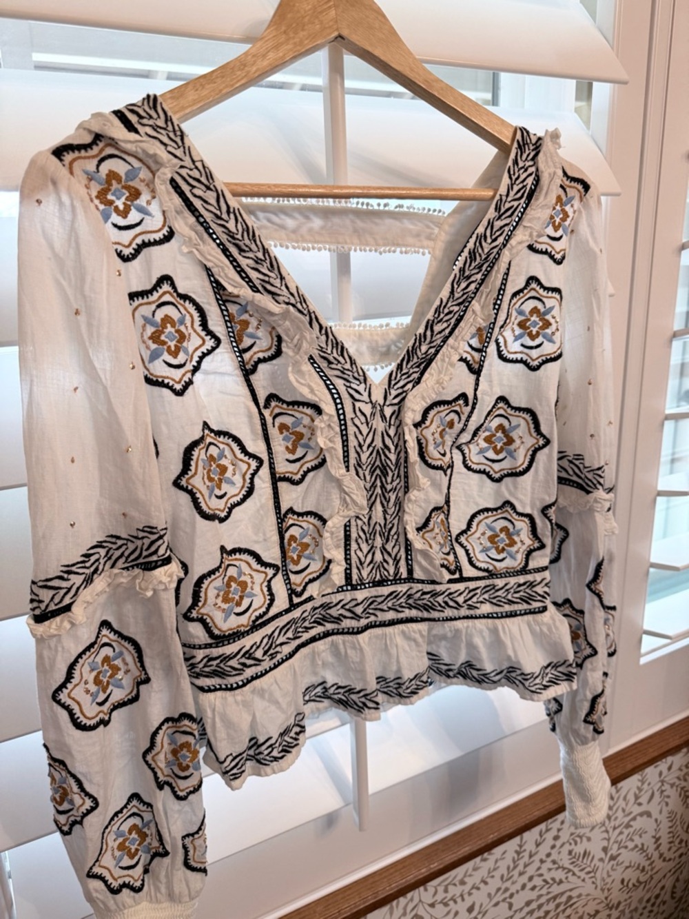Anthropologie White Embroidered V-Neck Blouse with Black & Gold Motifs